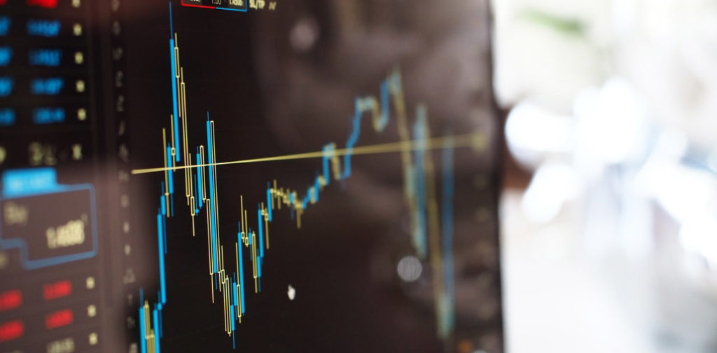 A stock graph showing highs and lows of stocks on a computer screen